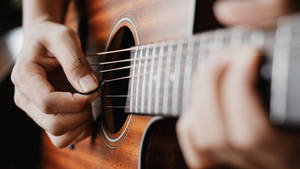 Acoustic Guitar Hands Strumming Wallpaper