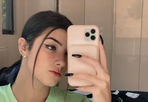 Addison And Charli, Two Friends Embracing Wallpaper