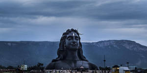Adiyogi Shiva On A Gloomy Day Wallpaper