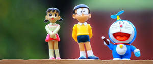 Adorable Action Figure Nobita Shizuka Wallpaper