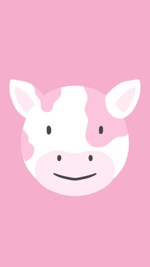 Adorable Strawberry Cow With Innocent Expressions Wallpaper