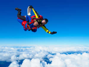 Adrenaline Rush In The Sky: Skydiving Wallpaper