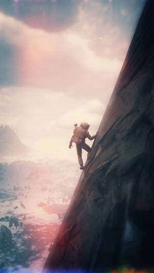 Adventurous Robot Initiating A Mountain Climb Wallpaper