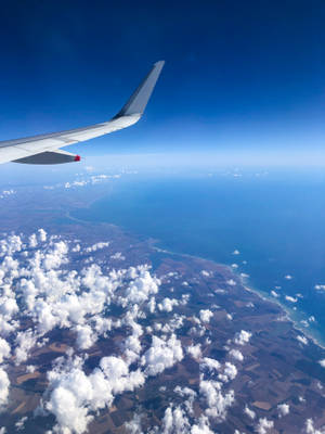 Aerial Wings Of Airplane Iphone Wallpaper