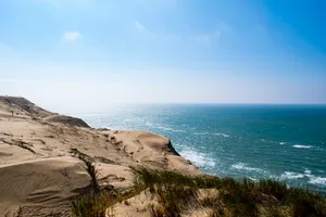 Aesthetic Blue Iphone, Immerse Yourself In A Dreamy Blue Haze Wallpaper