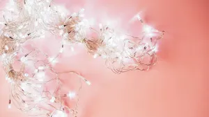 Aesthetic Computer Light Pink Fairy Lights Wallpaper