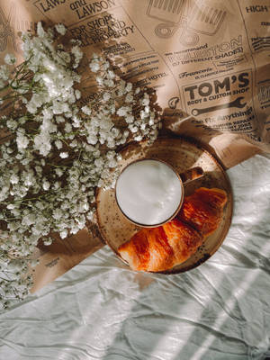 Aesthetic Light Brown Croissant And Coffee Wallpaper