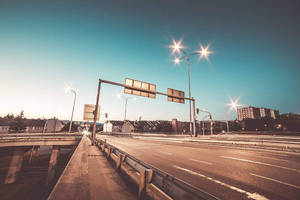 Aesthetic Light Brown Road Intersection Wallpaper