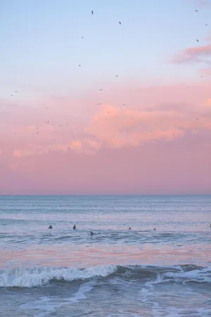 Aesthetic Pink Iphone Ocean And Sky Wallpaper