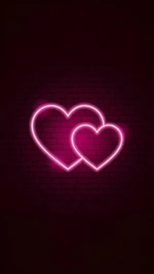 Aesthetic Pink Iphone Two Neon Hearts Wallpaper