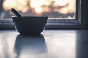 Aesthetic Silhouette Of Bowl On Window Wallpaper