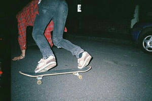 Aesthetic Skater Boy Night Shot Wallpaper