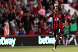 Afc Bournemouth Nathan Ake Running Wallpaper