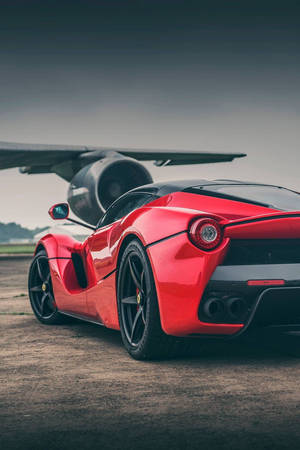 Aircraft Wing And Red La Ferrari Phone Wallpaper