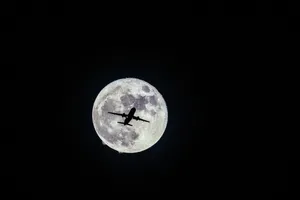 Airplane Silhouette And Moon Wallpaper