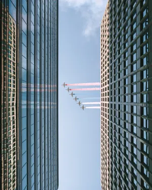 Airplane Smoke Building Wallpaper