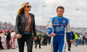 Aj Allmendinger And Tara - A Winning Moment Wallpaper