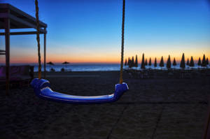 Albania Beach Blue Swing Wallpaper