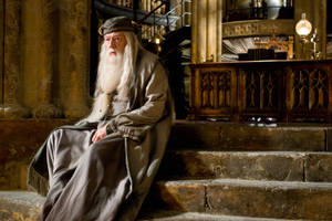 Albus Dumbledore Sitting Near The Altar Wallpaper