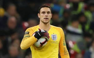 Alex Mccarthy Holding A Soccer Ball Wallpaper