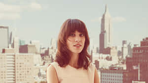 Alexa Chung Radiating Chic Charisma In A Stylish Outfit. Wallpaper