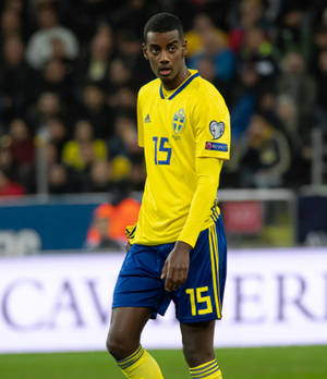 Alexander Isak Walking On The Field Wallpaper