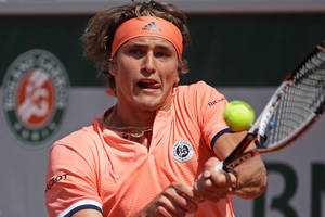 Alexander Zverev In Orange Wallpaper