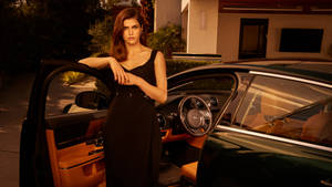 Alexandra Daddario 4k Classic Luxury Car Wallpaper