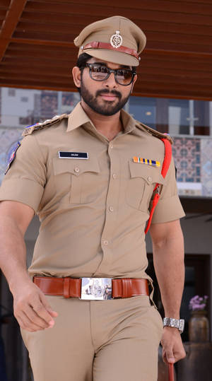 Allu Arjun In Brown Police Uniform Wallpaper