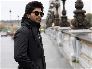 Allu Arjun Starring Down A Bridge In A Scene From Pushpa Wallpaper