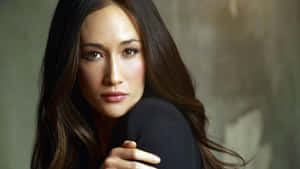 Alluring Maggie Q Posing Elegantly Wallpaper