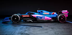 Alpine Race Car In Dark Room Wallpaper