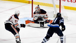 American Ice Hockey Player Kyle Connor Versus Edmonton Oilers Wallpaper