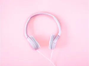 An Abstract Art Piece Featuring Grey And Pink Colors Wallpaper