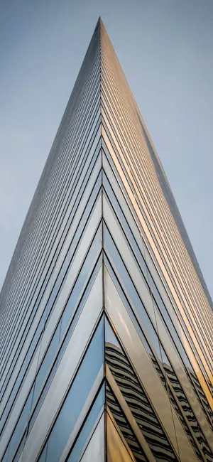 An Abstract Glowing Picture Of Yellow And Blue Light Wallpaper