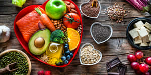 An Array Of Delicious Foods On A Table Ready To Be Enjoyed Wallpaper