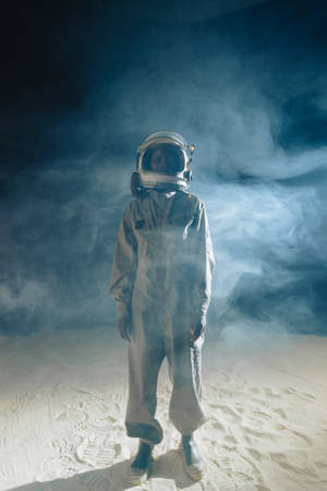 An Astronaut In Space Standing Still Wallpaper