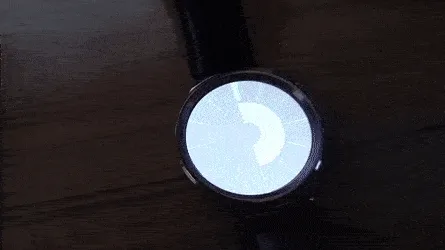 An Athlete Using A High-tech Smartwatch Wallpaper