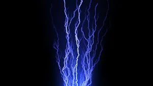 An Electric-blue Streak Of Lightning Pierces A Clear Night Sky Wallpaper