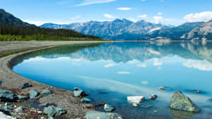 An Exhilarating View Of A Mountainous Landscape Wallpaper