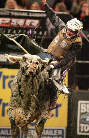 An Intense Bull Riding Competition Wallpaper