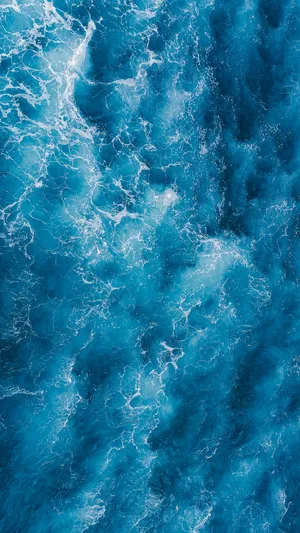 An Ocean Aesthetic Phone For A Colorful Touch Wallpaper