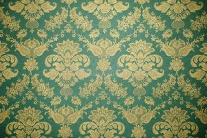 An Old Wallpaper With Gold And Green Floral Patterns Wallpaper