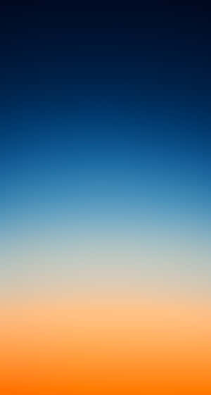 An Orange And Blue Sunset Background Wallpaper