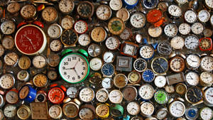 Analog Alarm Clock On A Table Wallpaper