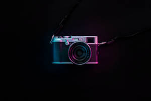 Analog Camera On Black Tablet Wallpaper