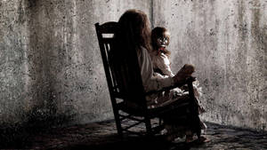 Annabelle And Woman On Chair Wallpaper