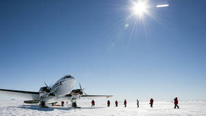 Antarctica With Airplane And People Wallpaper