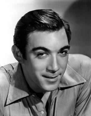 Anthony Quinn Tantalizing Smirk Wallpaper