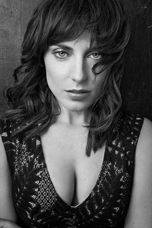Antje Traue In Black Sexy Top Wallpaper